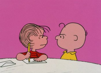 Movie still from “It's the Great Pumpkin, Charlie Brown” (1966), directed by Bill Melendez – A drawing of a boy and a bald man with a pencil; Close Up shot, Over the shoulder angle