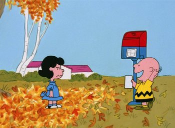 Movie still from “It's the Great Pumpkin, Charlie Brown” (1966), directed by Bill Melendez – A charlie brown and the gang in a field of fall leaves; Extreme Wide shot, High angle