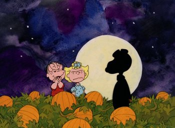 Movie still from “It's the Great Pumpkin, Charlie Brown” (1966), directed by Bill Melendez – A couple of people standing next to each other in a pumpkin patch; Extreme Wide shot, High angle
