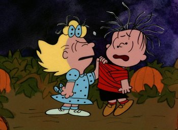 Movie still from “It's the Great Pumpkin, Charlie Brown” (1966), directed by Bill Melendez – A couple of people that are standing in the grass; Medium shot, High angle