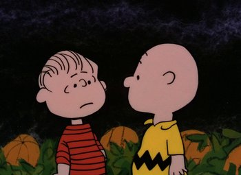 Movie still from “It's the Great Pumpkin, Charlie Brown” (1966), directed by Bill Melendez – A couple of people that are standing in the grass; Close Up shot, High angle