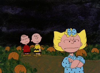 Movie still from “It's the Great Pumpkin, Charlie Brown” (1966), directed by Bill Melendez – A painting of charlie brown , linus , and sally in a pumpkin patch; Wide shot, High angle