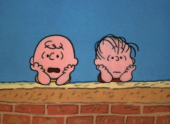 Movie still from “It's the Great Pumpkin, Charlie Brown” (1966), directed by Bill Melendez – A painting of a couple of people sitting next to a brick wall; Close Up shot, Low angle