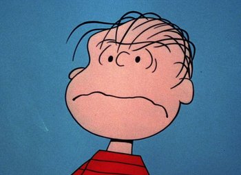 Movie still from “It's the Great Pumpkin, Charlie Brown” (1966), directed by Bill Melendez – A cartoon face of a charlie brown character; Close Up shot, Low angle