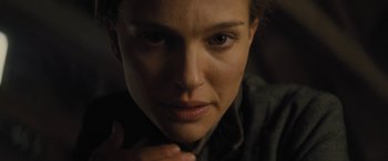 Movie still from “Jane Got a Gun” (2015), directed by Gavin O'Connor – A woman's face as she stares into the camera; Close Up shot, Over the shoulder angle