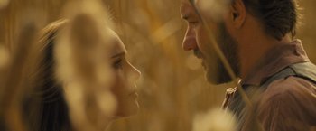 Movie still from “Jane Got a Gun” (2015), directed by Gavin O'Connor – A man and a woman looking at each other; Close Up shot, Low angle