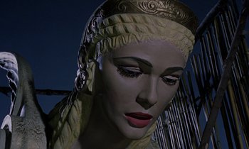 Movie still from “Jason and the Argonauts” (1963), directed by Don Chaffey – A statue of a woman wearing a headscarf; Close Up shot, Low angle