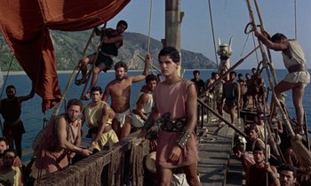Movie still from “Jason and the Argonauts” (1963), directed by Don Chaffey – A group of people on a boat in the water; Wide shot, High angle