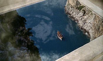 Movie still from “Jason and the Argonauts” (1963), directed by Don Chaffey – An aerial view of a boat in a body of water; Extreme Wide shot, Overhead angle