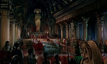 Movie still from “Jason and the Argonauts” (1963), directed by Don Chaffey – People are gathered in an elaborate setting for an event; Extreme Wide shot, High angle