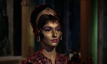 Movie still from “Jason and the Argonauts” (1963), directed by Don Chaffey – A woman in a costume is posing for a picture; Close Up shot, High angle