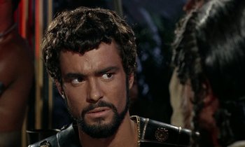 Movie still from “Jason and the Argonauts” (1963), directed by Don Chaffey – A person with a beard; Close Up shot, Over the shoulder angle