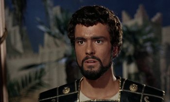 Movie still from “Jason and the Argonauts” (1963), directed by Don Chaffey – A person with a beard; Close Up shot, Over the shoulder angle
