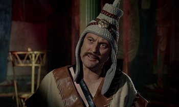 Movie still from “Jason and the Argonauts” (1963), directed by Don Chaffey – A man wearing a hat and a leather jacket; Close Up shot, Low angle