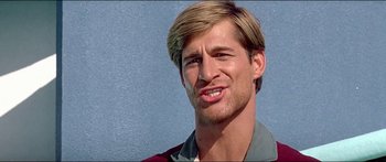 Movie still from “Jaws 3-D” (1983), directed by Joe Alves – A person wearing a jacket; Close Up shot, Low angle