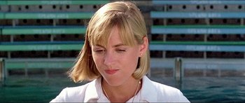 Movie still from “Jaws 3-D” (1983), directed by Joe Alves – A person wearing a white shirt; Close Up shot, Low angle