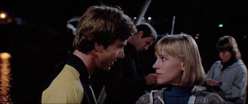Movie still from “Jaws 3-D” (1983), directed by Joe Alves – A man and a woman talking to each other; Close Up shot, Over the shoulder angle