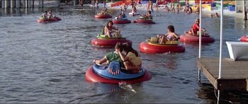 Movie still from “Jaws 3-D” (1983), directed by Joe Alves – A group of people on small boats in the water; Extreme Wide shot, High angle