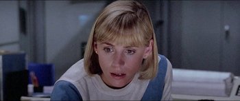 Movie still from “Jaws 3-D” (1983), directed by Joe Alves – A person with short blonde hair; Close Up shot, Low angle