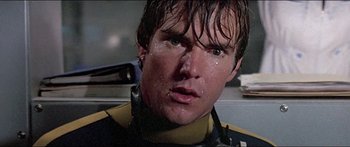 Movie still from “Jaws 3-D” (1983), directed by Joe Alves – A person with wet hair; Close Up shot, Low angle