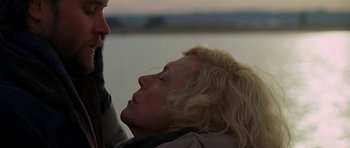 Movie still from “Jaws: The Revenge” (1987), directed by Joseph Sargent – A person with their eyes closed; Close Up shot, Low angle