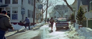 Movie still from “Jaws: The Revenge” (1987), directed by Joseph Sargent – People walking down a street in the snow; Extreme Wide shot, High angle