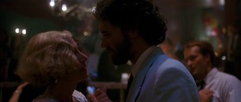 Movie still from “Jaws: The Revenge” (1987), directed by Joseph Sargent – A man and a woman talking to each other; Close Up shot, Low angle