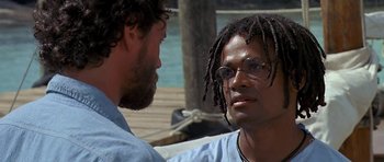 Movie still from “Jaws: The Revenge” (1987), directed by Joseph Sargent – A man and a woman talking to each other; Close Up shot, Over the shoulder angle