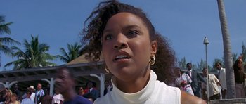 Movie still from “Jaws: The Revenge” (1987), directed by Joseph Sargent – A person wearing a white shirt; Close Up shot, Low angle