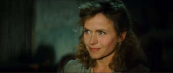 Movie still from “Jean de Florette” (1986), directed by Claude Berri – A person wearing a gray shirt; Close Up shot, Over the shoulder angle