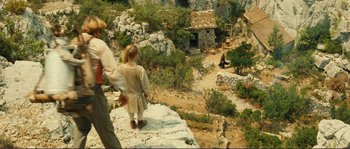 Movie still from “Jean de Florette” (1986), directed by Claude Berri – A woman and a child are walking on a rocky path; Extreme Wide shot, High angle