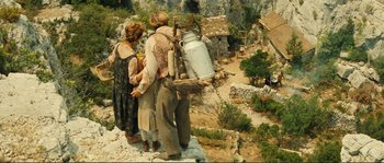 Movie still from “Jean de Florette” (1986), directed by Claude Berri – A group of people standing on top of a hill; Wide shot, High angle