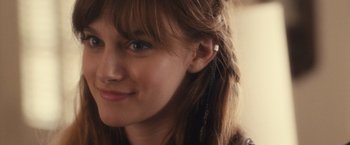 Movie still from “Jem and the Holograms” (2015), directed by Jon M. Chu – A young woman's face; Close Up shot, Over the shoulder angle