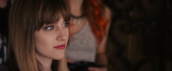 Movie still from “Jem and the Holograms” (2015), directed by Jon M. Chu – A person with blue eyes; Close Up shot, Over the shoulder angle