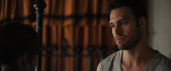 Movie still from “Jem and the Holograms” (2015), directed by Jon M. Chu – A person wearing a shirt; Close Up shot, Over the shoulder angle