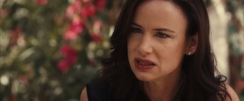 Movie still from “Jem and the Holograms” (2015), directed by Jon M. Chu – A person with long dark hair; Close Up shot, Over the shoulder angle