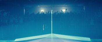 Movie still from “Jem and the Holograms” (2015), directed by Jon M. Chu – A crowd of people in a room at a concert; Wide shot, High angle