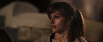 Movie still from “Jem and the Holograms” (2015), directed by Jon M. Chu – A person looking at the camera; Close Up shot, Over the shoulder angle