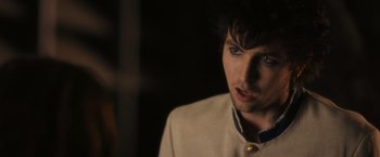 Movie still from “Jem and the Holograms” (2015), directed by Jon M. Chu – A person wearing a jacket; Close Up shot, Over the shoulder angle