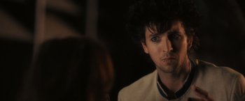 Movie still from “Jem and the Holograms” (2015), directed by Jon M. Chu – A person looking at the camera; Close Up shot, Over the shoulder angle