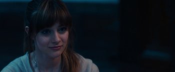 Movie still from “Jem and the Holograms” (2015), directed by Jon M. Chu – A person sitting in a room; Close Up shot, Over the shoulder angle