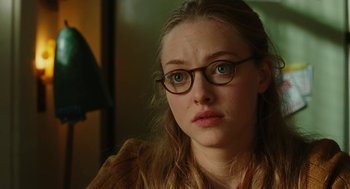 Movie still from “Jennifer's Body” (2009), directed by Karyn Kusama – A person wearing glasses; Close Up shot, Over the shoulder angle