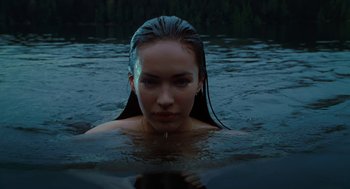 Movie still from “Jennifer's Body” (2009), directed by Karyn Kusama – A woman in a body of water at night; Close Up shot, Low angle