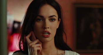 Movie still from “Jennifer's Body” (2009), directed by Karyn Kusama – A beautiful young woman with long dark hair; Close Up shot, Low angle