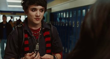 Movie still from “Jennifer's Body” (2009), directed by Karyn Kusama – A young man is talking to a woman in front of lockers; Close Up shot, Over the shoulder angle