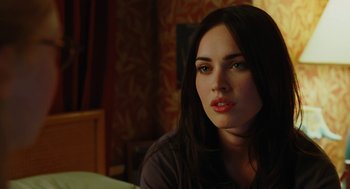 Movie still from “Jennifer's Body” (2009), directed by Karyn Kusama – A beautiful young lady sitting in front of a mirror; Close Up shot, Over the shoulder angle