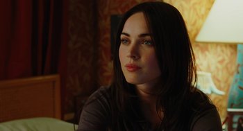 Movie still from “Jennifer's Body” (2009), directed by Karyn Kusama – A beautiful young lady sitting in front of a mirror; Close Up shot, Over the shoulder angle