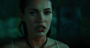 Movie still from “Jennifer's Body” (2009), directed by Karyn Kusama – A person with wet hair; Close Up shot, Low angle
