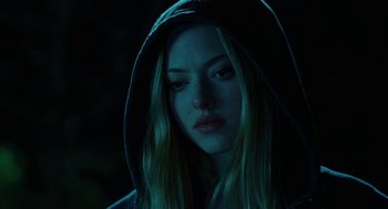 Movie still from “Jennifer's Body” (2009), directed by Karyn Kusama – A woman in a hooded jacket looking at the camera; Close Up shot, Low angle