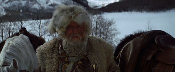 Movie still from “Jeremiah Johnson” (1972), directed by Sydney Pollack – An old man with a beard and a fur hat; Close Up shot, Low angle